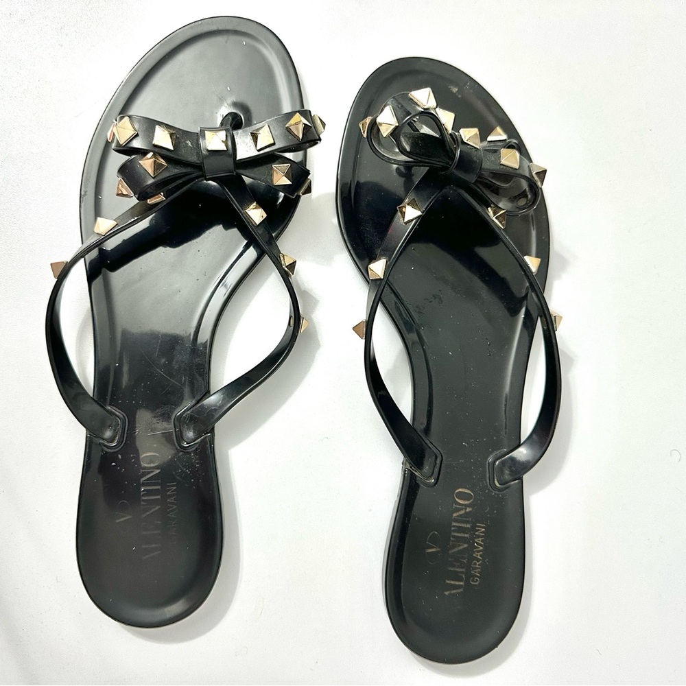 Valentino Garavani Black Jelly Bow Sandals with Gold Studs